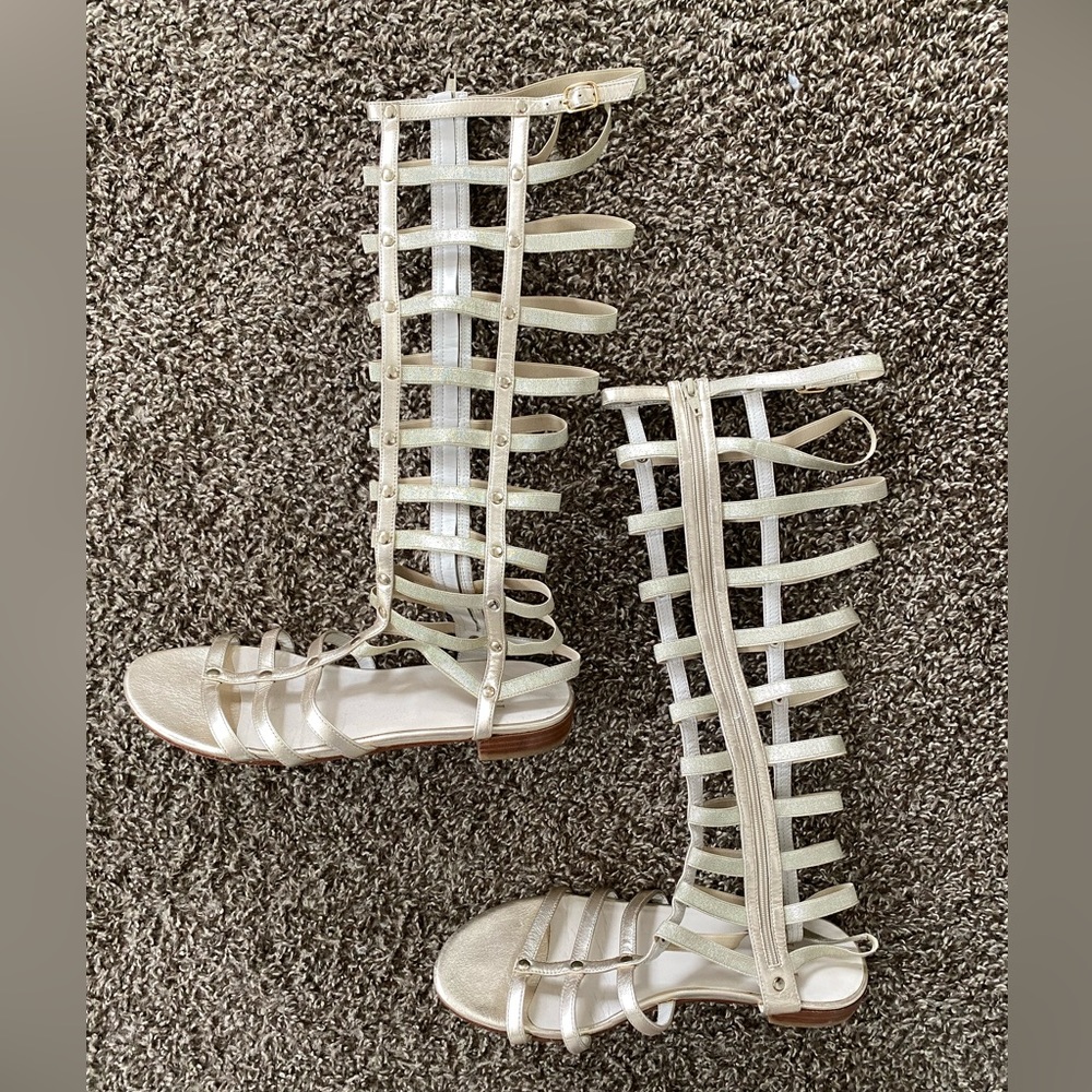 Stuart Weitzman Gladiator Sandal in Gold, size 8